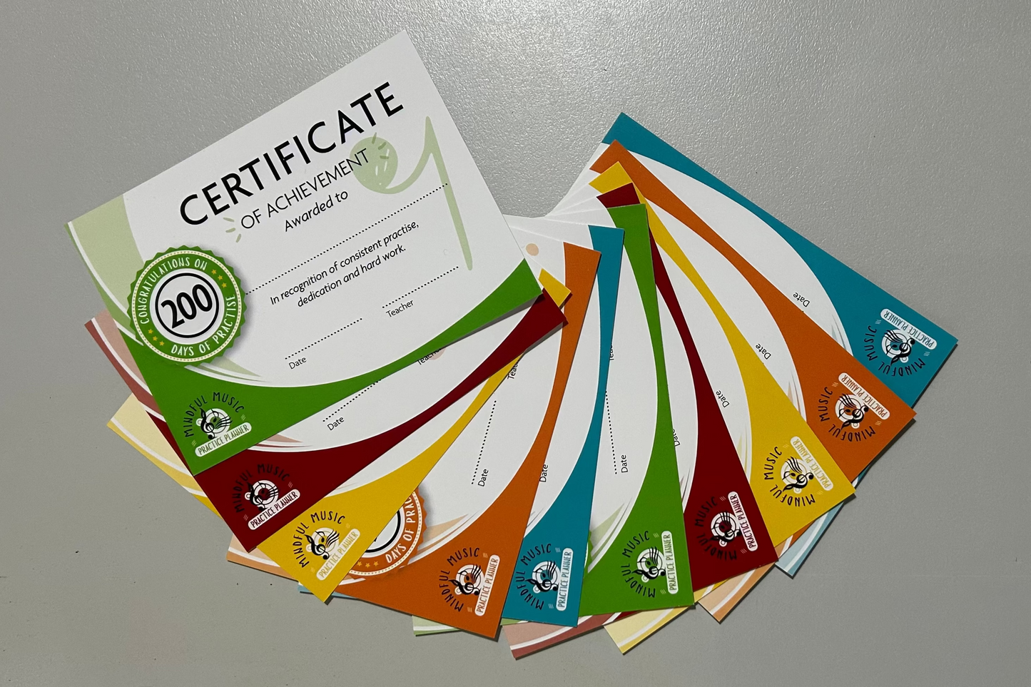 Collection of colourful certificates suitable for piano, guitar, violin or drum lessons and tuition.