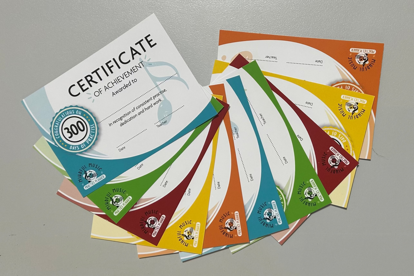 Collection of colourful certificates suitable for piano, guitar, violin or drum lessons and tuition.